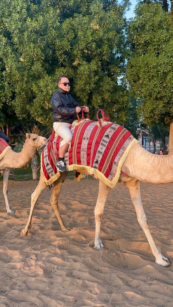 Man riding a camel